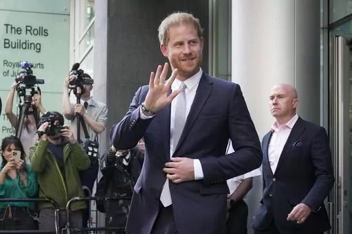 Prince Harry leaves the High Court after giving evidence in London, on June 7, 2023. Prince Harry won his phone hacking lawsuit Friday Dec. 15, 2023 against the publisher of the Daily Mirror and was awarded over 140,000 pounds ($180,000) in the first of his several lawsuits against the tabloids to go to trial. (AP Photo/Kin Cheung, File)