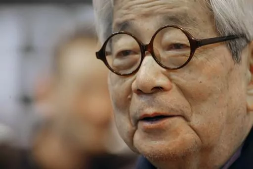 Japanese Nobel Prize winning author Kenzaburo Oe poses during the inauguration of the 32nd Paris Book Fair, which focused on Japanese writers, March 15, 2012. Japanese publisher Kodansha Ltd. said Monday, March 13, 2023 that Nobel literature laureate Kenzaburo Oe died of old age. Oe's darkly poetic novels were built from a childhood during Japan’s postwar occupation and parenthood with a disabled son. (AP Photo/Jacques Brinon, File)