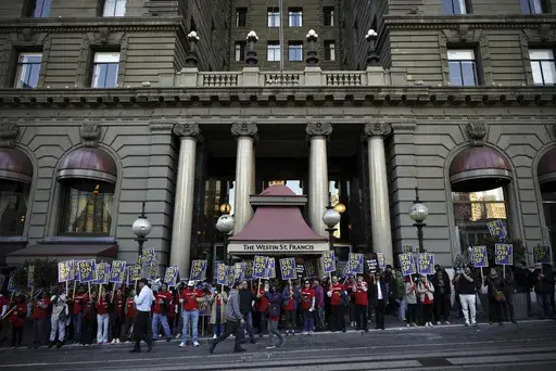 Hotel workers and members of Unite Here Local 2 march through downtown in San Francisco, on Oct. 30, 2024. (Carlos Avila Gonzalez/San Francisco Chronicle via AP, File)