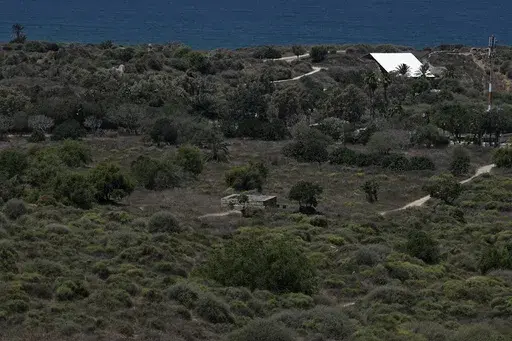The site of the Palestinian village of Al-Jura, where the parents of Hamas top leader Ismail Haniyeh lived before they fled to the Gaza Strip during the 1948 Arab-Israeli war, seen on the outskirts of Ashkelon, southern Israel, Wednesday, July 31, 2024. Haniyeh was killed by a predawn airstrike in the Iranian capital Wednesday. (AP Photo/Tsafrir Abayov)