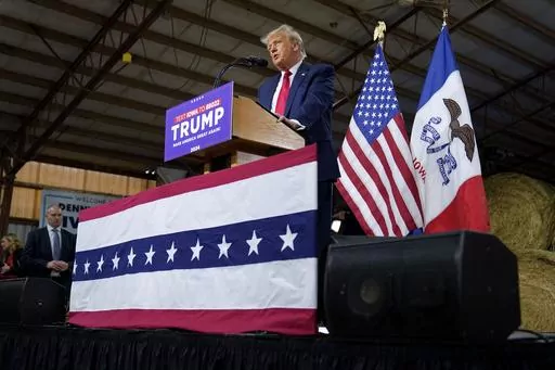 Former President Donald Trump speaks during a commit to caucus rally, Monday, Oct. 16, 2023, in Adel, Iowa. (AP Photo/Charlie Neibergall, File)