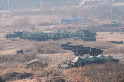 U.S. Army's armored vehicles prepare to cross the Hantan river at a training field in Yeoncheon, South Korea, near the border with North Korea, Monday, March 10, 2025. (AP Photo/Ahn Young-joon)