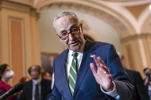 Senate Majority Leader Chuck Schumer, D-N.Y., meets with reporters following a Democratic Caucus meeting, at the Capitol in Washington, Tuesday, April 5, 2022. (AP Photo/J. Scott Applewhite)