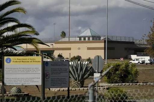 The Federal Correctional Institution stands in Dublin, Calif., on Dec. 5, 2022. Federal investigators on Monday, March 11, 2024, are again searching the troubled women's prison, seizing computers and documents in an apparent escalation of a yearslong sexual abuse investigation that led to previous charges against a former warden and other employees. (AP Photo/Jeff Chiu, File)