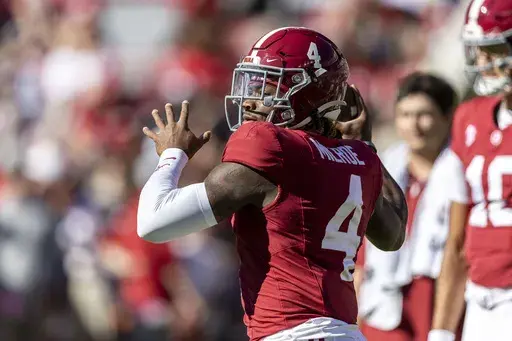 Alabama quarterback Jalen Milroe (4) warms up before an NCAA college football game against Mercer, Saturday, Nov. 16, 2024, in Tuscaloosa, Ala. (AP Photo/Vasha Hunt)
