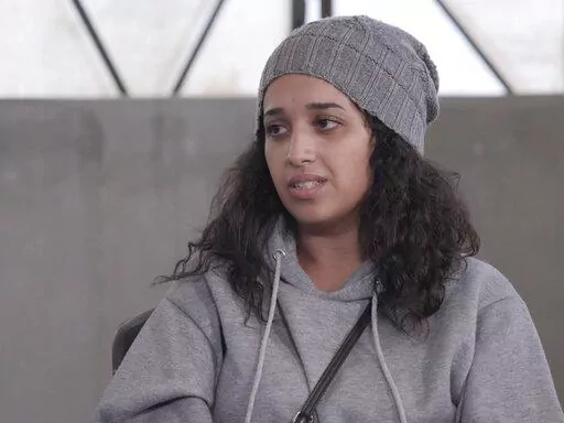 In this image taken from video Hoda Muthana talks during an interview in Roj detention camp in Syria where she is being held by U.S.-allied Kurdish forces, Wednesday, Nov. 9, 2022. Muthana, who ran away from home in Alabama at the age of 20, joined the Islamic State group and had a child with one of its fighters says she still hopes to return to the United States, serve prison time if necessary, and advocate against the extremists. (AP Photo/The News Movement)
