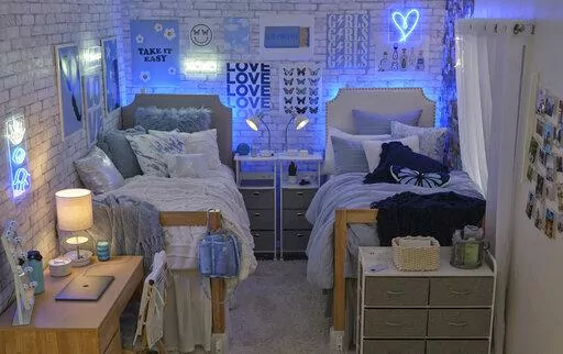 This image provided by Dormify shows a dorm display from Dormify.com. It's dorm shopping season for parents sending their kids off to college. (Dormify.com via AP)