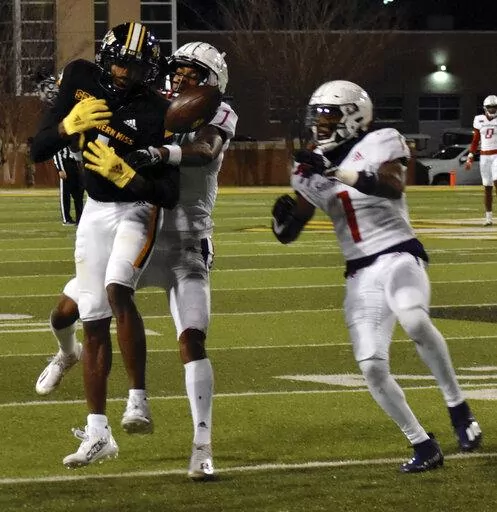 Southern Mississippi wide receiver Jason Brownlee drops a pass against South Alabama in the fourth quarter of an NCAA college football game in Hattiesburg, Miss., Saturday, Nov. 19, 2022. (Aimee Cronan/The Gazebo Gazette via AP)