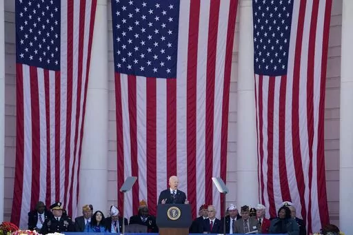 President Joe Biden speaks at the National Veterans Day Observance at the Memorial Amphitheater at Arlington National Cemetery in Arlington, Va., Saturday, Nov. 11, 2023. (AP Photo/Andrew Harnik)