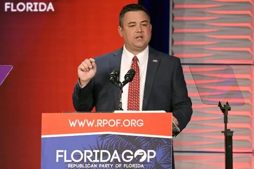 Republican Party of Florida Chairman Christian Ziegler addresses attendees at the Republican Party of Florida Freedom Summit, Saturday, Nov. 4, 2023, in Kissimmee, Fla. Police cleared Ziegler, the ousted chair of the Florida Republican Party, of rape allegations on Friday, Jan 19, 2024, but said they have asked prosecutors to charge him with illegally video recording the sexual encounter he had with a female acquaintance. (AP Photo/Phelan M. Ebenhack, File)