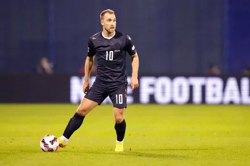 Denmark's Christian Eriksen in action during the UEFA Nations League soccer match between Croatia and Denmark at the Maksimir stadium in Zagreb, Croatia, on Sept. 22, 2022. Denmark will wear team jerseys at the World Cup that protest the human rights record of host nation Qatar, with a black option to honor migrant workers who died during construction work for the tournament. “The color of mourning,” kit manufacturer Hummel said when releasing the black third-choice design. (AP Photo/Darko B
