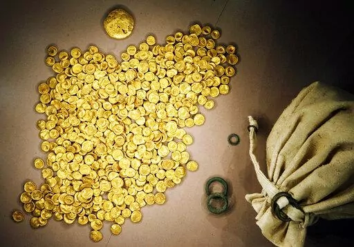 FILE -- Coins of the Celtic Treasure are on display at the local Celtic and Roman Museum in Manching, Germany, May 31, 2006. A senior official said Wednesday that organized crime groups were likely behind the theft of a huge horde of ancient gold coins stolen from a museum in southern Germany this week. (Frank Maechler/dpa via AP, file)