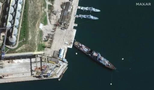 This satellite image provided by Maxar Technologies shows cruiser Moskva in port Sevastopol in Crimea on April 7, 2022. (Satellite image ©2022 Maxar Technologies via AP)