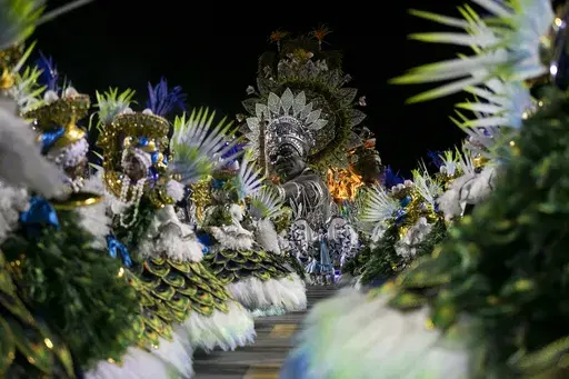 Performers from the Unidos da Tijuca samba school dance during Carnival celebrations at the Sambadrome in Rio de Janeiro, Monday, March 3, 2025. (AP Photo/Bruna Prado)