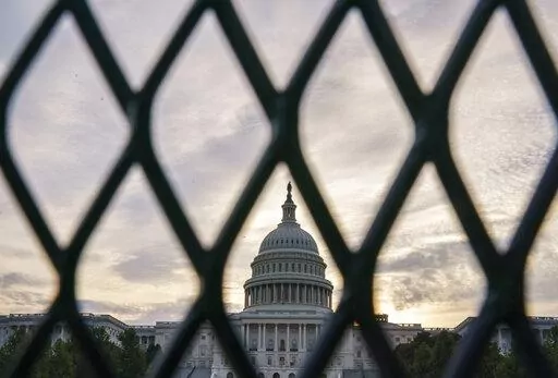 Security fencing shown around the Capitol in Washington, Sept. 16, 2021. Fencing installed around the U.S. Capitol for months after the January 2021 insurrection will be put back up before President Joe Biden’s State of the Union address on Tuesday as concern grows about potential demonstrations or truck convoys snarling traffic in the nation’s capital.  Capitol Police Chief Tom Manger said in a statement Sunday that the fence will be erected around the Capitol building for the speech and is