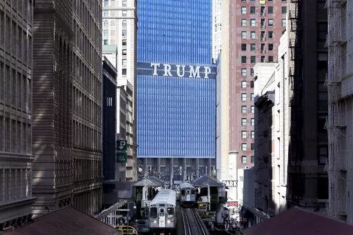 The Trump International Hotel and Tower is seen looking north on Wabash Ave. in Chicago's famed Loop, on Sept. 17, 2014. A Manhattan judge said Thursday, Nov. 3, 2022, that he will appoint an independent monitor for former President Donald Trump’s real estate empire, restricting his company's ability to freely make deals, sell assets and change its corporate structure. (AP Photo/Charles Rex Arbogast, File)