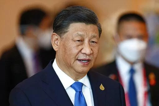 China's President Xi Jinping arrives to attend the APEC Economic Leaders Meeting during the Asia-Pacific Economic Cooperation, APEC summit, Nov. 19, 2022, in Bangkok, Thailand. The CIA director says U.S. intelligence shows that China’s President Xi Jinping has instructed his country’s military to “be ready by 2027” to invade Taiwan. But CIA Director William Burns also says Xi may be currently harboring doubts about his ability to make a move against Taiwan, given Russia’s experience in