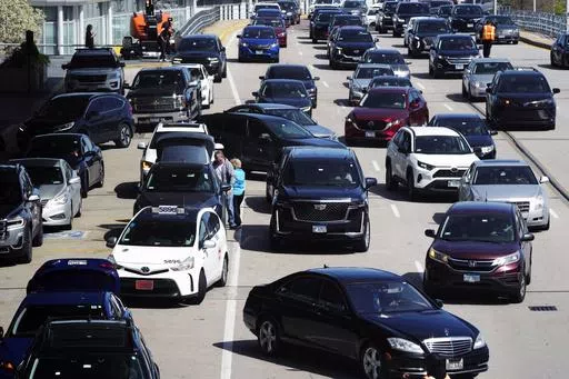 Heavy traffic is seen at O'Hare International Airport in Chicago, Monday, April 15, 2024. Relentlessly rising auto insurance rates are squeezing car owners and stoking inflation. Auto insurance rates rose 2.6% in March and are up 22% from a year ago. (AP Photo/Nam Y. Huh, File)