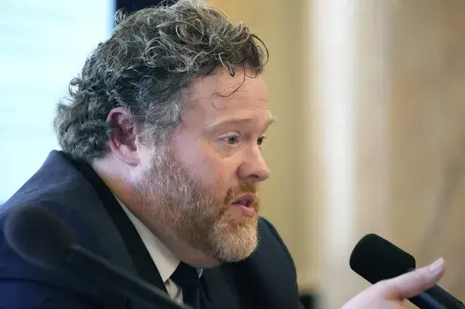 Drew Snyder, executive director of the Mississippi Division of Medicaid, gives members of the House of Representatives Medicaid Committee an outline of the state's Medicaid program at the Mississippi Capitol, Feb. 7, 2024, in Jackson, Miss. (AP Photo/Rogelio V. Solis, File)