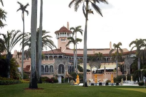 President Donald Trump's Mar-a-Lago estate is seen from the media van in the presidential motorcade in Palm Beach, Fla., March 24, 2018, en route to Trump International Golf Club in West Palm Beach, Fla. Christina Bobb, a lawyer for former president Donald Trump who signed a letter stating that a “diligent search” for classified records had been conducted and that all such documents had been given back to the government has spoken with the FBI, according to a person familiar with the matter.