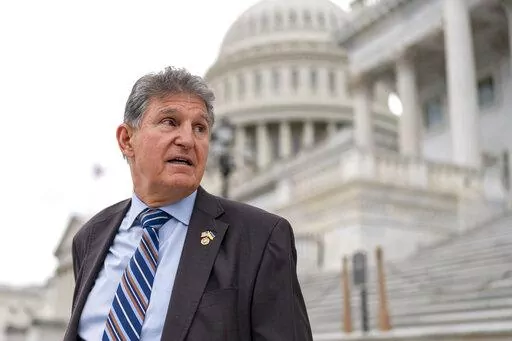 Sen. Joe Manchin, D-W.Va., departs as the Senate breaks for the Memorial Day recess, at the Capitol in Washington, May 26, 2022. A Democratic economic package focused on climate and health care faces hurdles but seems headed toward party-line passage by Congress next month.  Senate Majority Leader Chuck Schumer, D-N.Y., crafted a compromise package with Manchin, to the surprise of everyone, transforming the West Virginian from pariah to partner. (AP Photo/J. Scott Applewhite, File)