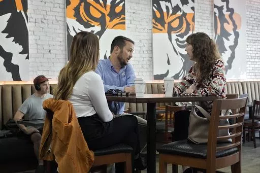 Customers drink coffee at the Blind Tiger Cafe Jan. 10, 2024, in Tampa, Fla. On Wednesday, April 10, 2024, the Labor Department issues its report on inflation at the consumer level in March. (AP Photo/Chris O'Meara, File)