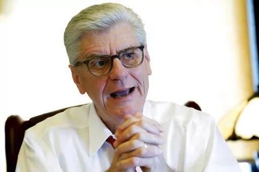 Gov. Phil Bryant speaks about his legacy following a life of public service in his office at the Capitol in Jackson, Miss., on Jan. 8, 2020. A defendant in a Mississippi welfare fraud case said in a court document she directed $1.1 million in welfare money to former NFL star Brett Favre at the direction of Bryant.  Mississippi news outlets report that the accusation, which Bryant denies, is in a filing on behalf of defendant Nancy New, who, with her son, once ran a nonprofit group and an educati