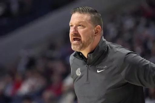 Mississippi head coach Chris Beard shouts instructions to his team during the first half of an NCAA college basketball game against Alabama, Wednesday, Feb. 28, 2024, in Oxford, Miss. Mississippi coach Chris Beard has agreed to a new contract after a debut season when he won his first 13 games to earn a national ranking. Keith Carter, the Ole Miss vice chancellor for intercollegiate athletics, announced the new deal on Wednesday, March 13, 2024. (AP Photo/Rogelio V. Solis, File)