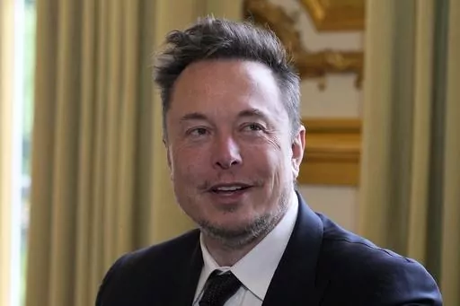 Twitter, now X. Corp, and Tesla CEO Elon Musk poses prior to his talks with French President Emmanuel Macron, May 15, 2023 at the Elysee Palace in Paris. Florida Gov. Ron DeSantis will announce his 2024 presidential campaign in a Twitter Spaces event with Musk on Wednesday, May 24. (AP Photo/Michel Euler, Pool, File)