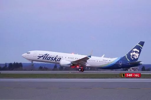 The first Alaska Airlines passenger flight on a Boeing 737-9 Max airplane takes off, Monday, March 1, 2021, on a flight to San Diego from Seattle-Tacoma International Airport in Seattle. The subscription pricing model is trending in the travel industry. Alaska Airlines recently launched a subscription service for West Coast flyers, offering 1-cent flights (on top of a monthly fee) for flights between California, Nevada and Arizona.  (AP Photo/Ted S. Warren, File)