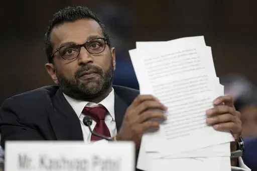 Kash Patel, President Donald Trump's choice to be director of the FBI, appears before the Senate Judiciary Committee for his confirmation hearing, at the Capitol in Washington, Thursday, Jan. 30, 2025. (AP Photo/Ben Curtis)