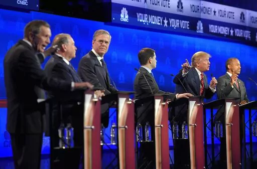 From left, Ohio Gov. John Kasich, former Arkansas Gov. Mike Huckabee, former Florida Gov. Jeb Bush, Sen. Marco Rubio, R-Fla., Donald Trump and Ben Carson, participate in a debate for Republican presidential hopefuls in Boulder, Colo., Oct. 28, 2015. It's been more than seven years since the 2016 presidential campaign, and Republicans are still trying to figure out how to run against Donald Trump. (AP Photo/Mark J. Terrill, File)