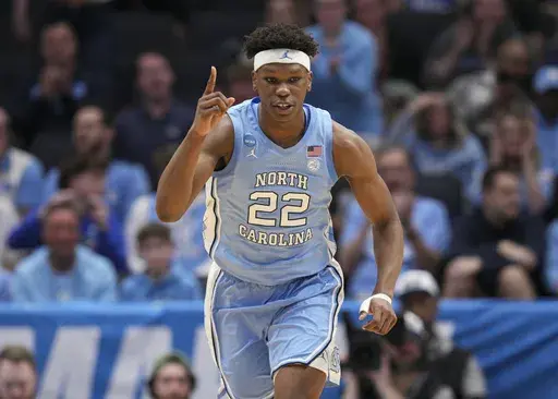 North Carolina forward Ven-Allen Lubin reacts after scoring during the first half of a First Four college basketball game against San Diego State in the NCAA Tournament, Tuesday, March 18, 2025, in Dayton, Ohio. (AP Photo/Jeff Dean)