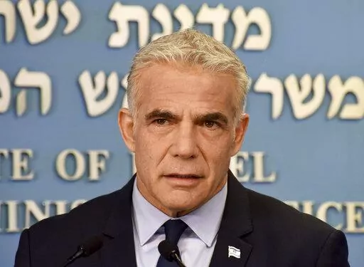 Israeli Prime Minister Yair Lapid speaks about Iran at a security briefing for the foreign press at the Prime Minister's office in Jerusalem, Wednesday, Aug. 24, 2022. Lapid called on U.S. President Joe Biden and Western powers to call off an emerging nuclear deal with Iran, saying an agreement would fail to prevent Iran from developing a nuclear bomb and reward it with billions of dollars to fund Israel's enemies. Israel's caretaker prime minister used stark language on Wednesday in his critici