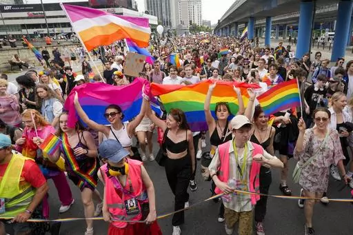 People take part in Poland's yearly Pride parade, known as the Equality Parade, in Warsaw, Poland, on Saturday June 17, 2023. This year's event was dedicated to transgender rights, which are facing a backlash in many countries. (AP Photo/Czarek Sokolowski)