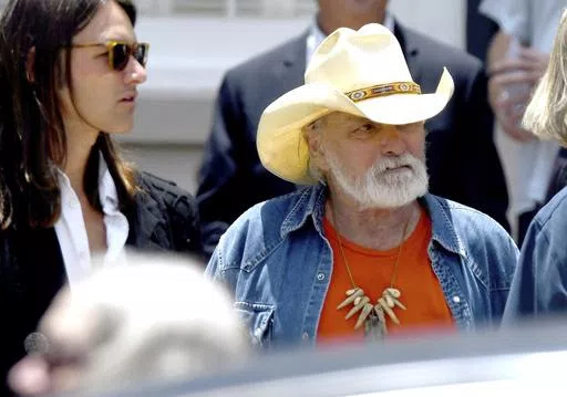 Dickey Betts, a founding member of the Allman Brothers Band, exits the funeral of Gregg Allman at Snow's Memorial Chapel, June 3, 2017, in Macon, Ga. Guitar legend Betts, who co-founded the Allman Brothers Band and wrote their biggest hit, “Ramblin’ Man,” died Thursday, April 18, 2024. He was 80. (Jason Vorhees/The Macon Telegraph via AP, File)